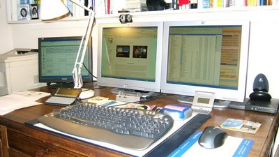Desk with three monitors